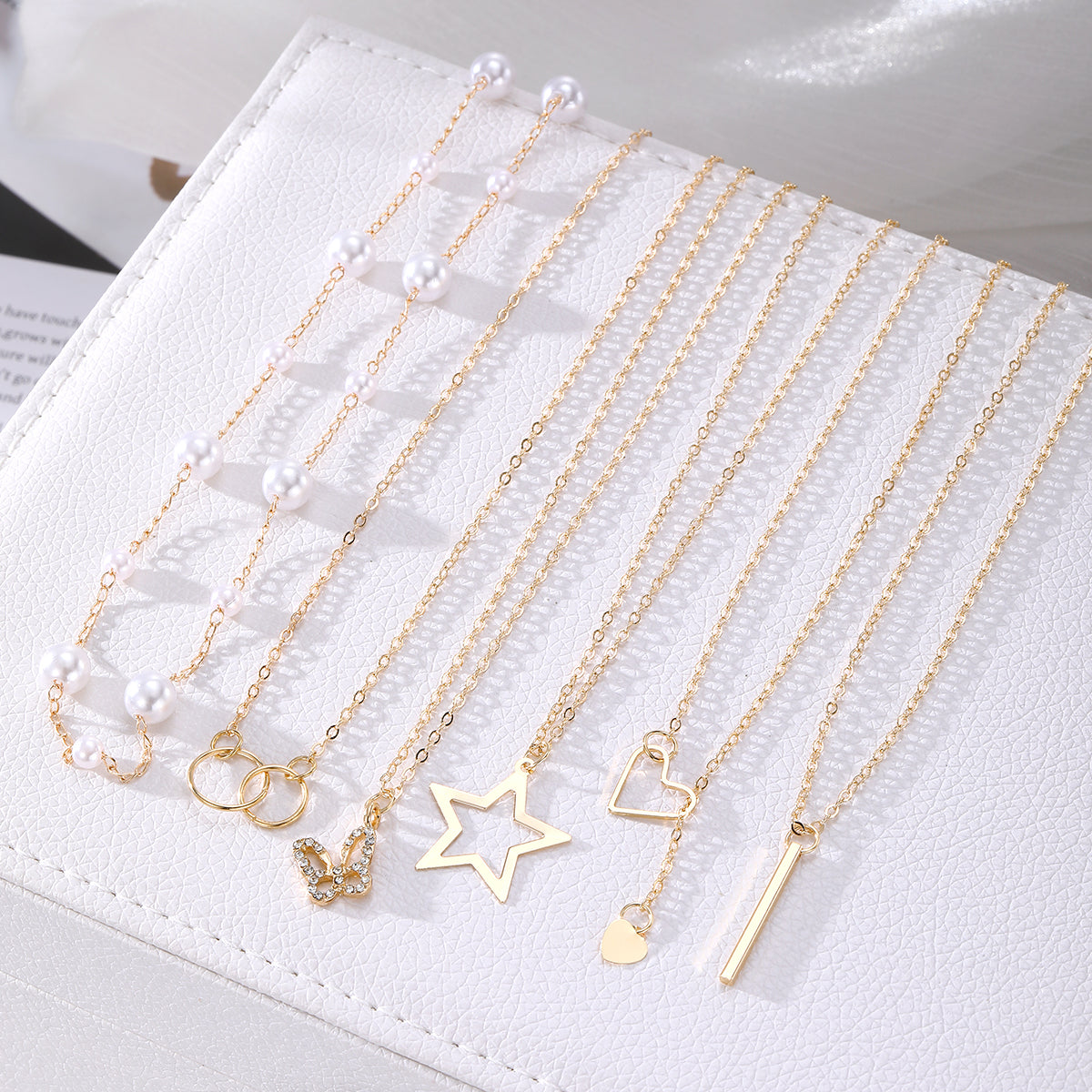 Conjunto de collares de varias capas chapados en oro – Elegancia de 6 piezas con estrellas y perlas